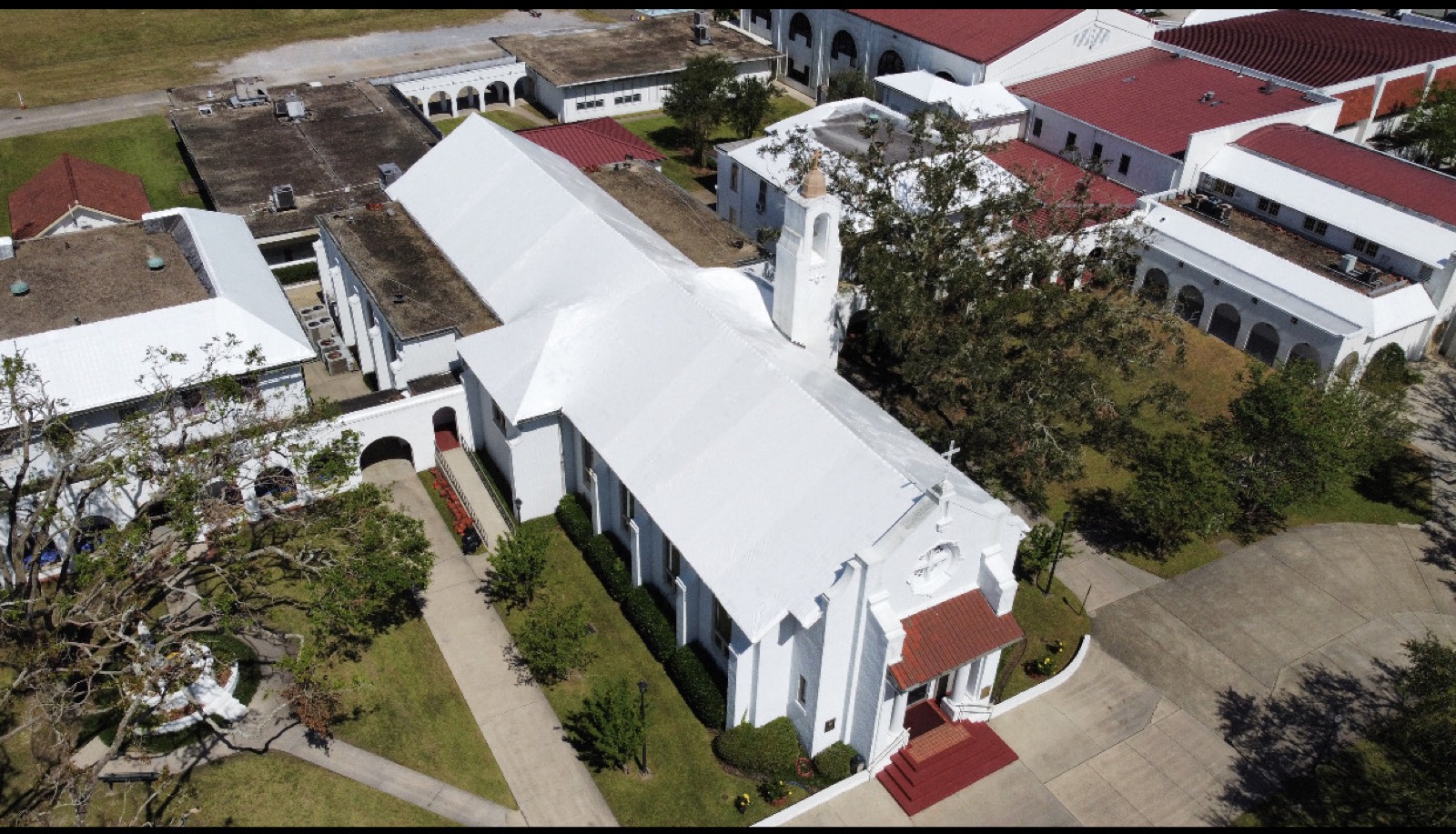 Riverside church sealed under a white Elastowrap roof in Destrehan Louisiana