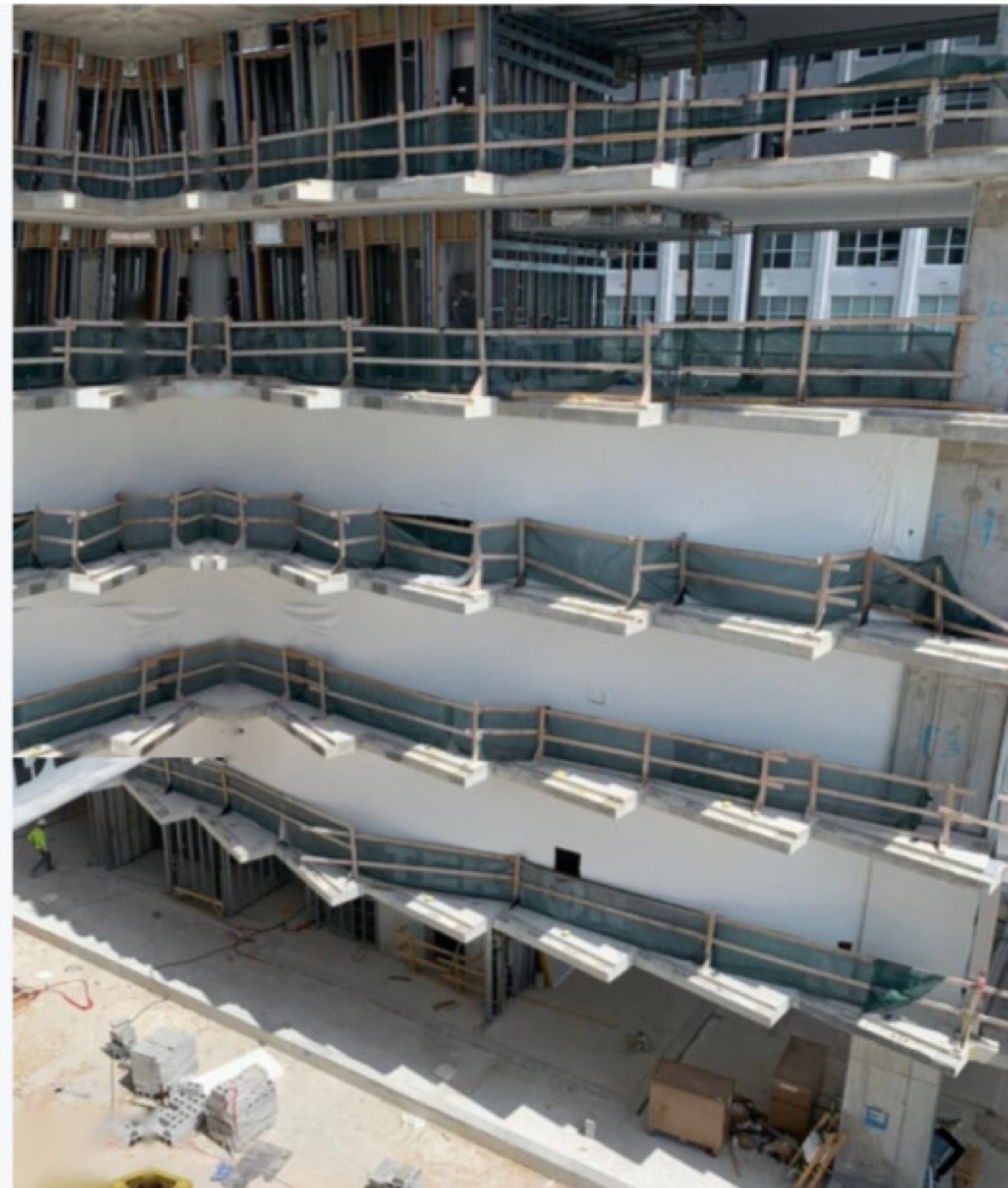 High-rise interior containment with Elastowrap sealing the perimeter floors