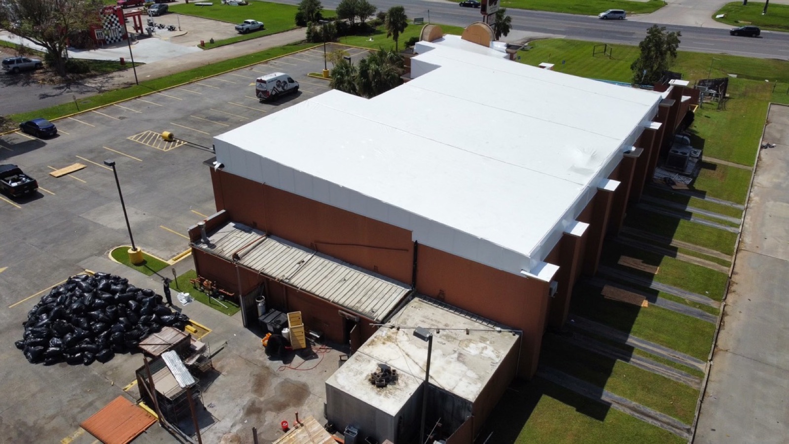 The same restaurant sealed under a white Titanium Tarps stretch wrap roof